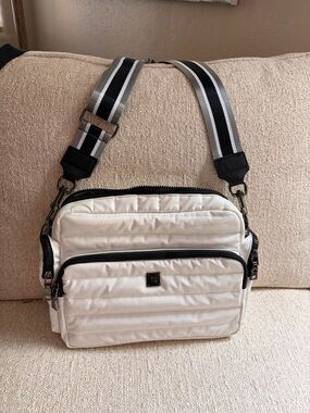 White Quilted Crossbody Bag with Striped Adjustable Strap